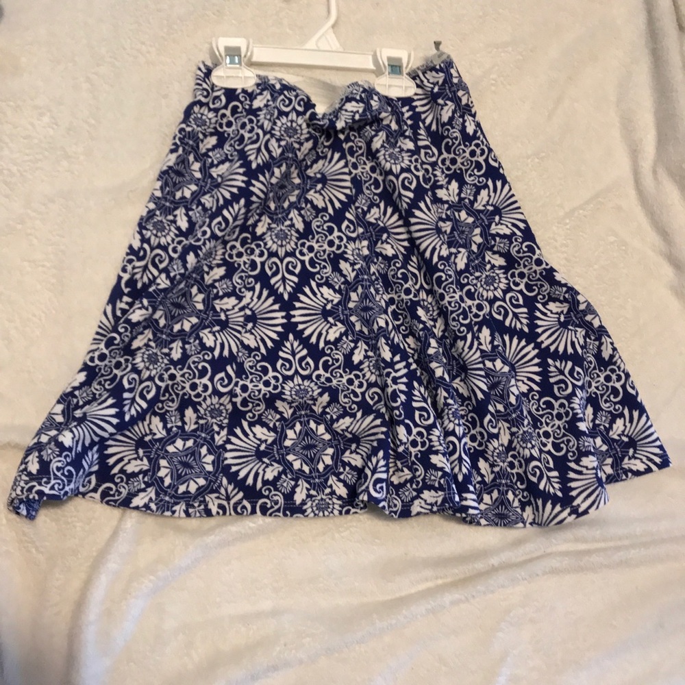 A blue and white med length skirt